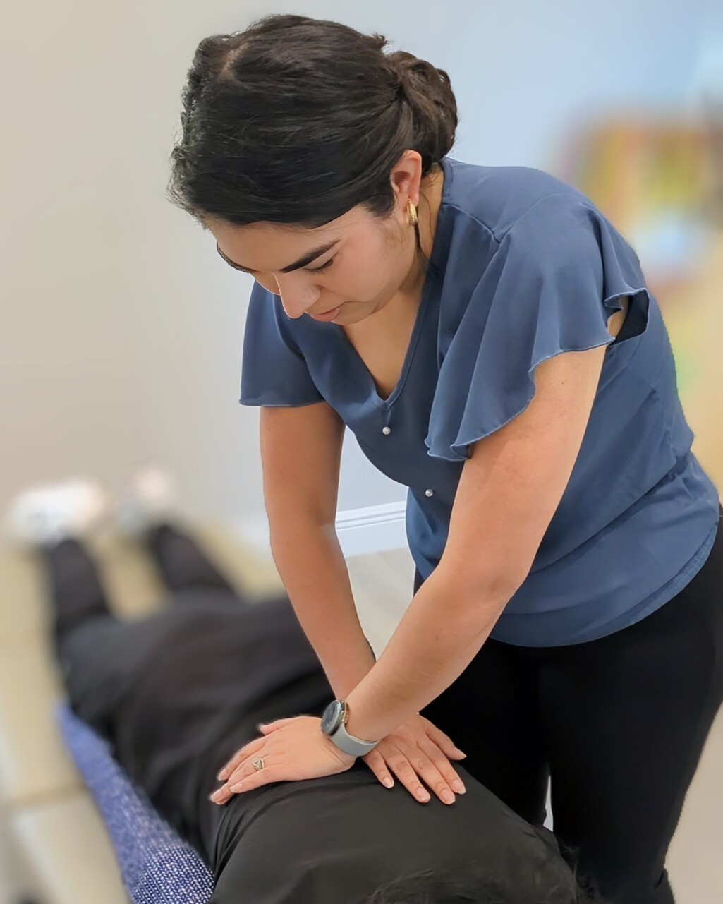 Dr. Crystal Corona providing gentle, hands-on cranial sacral care